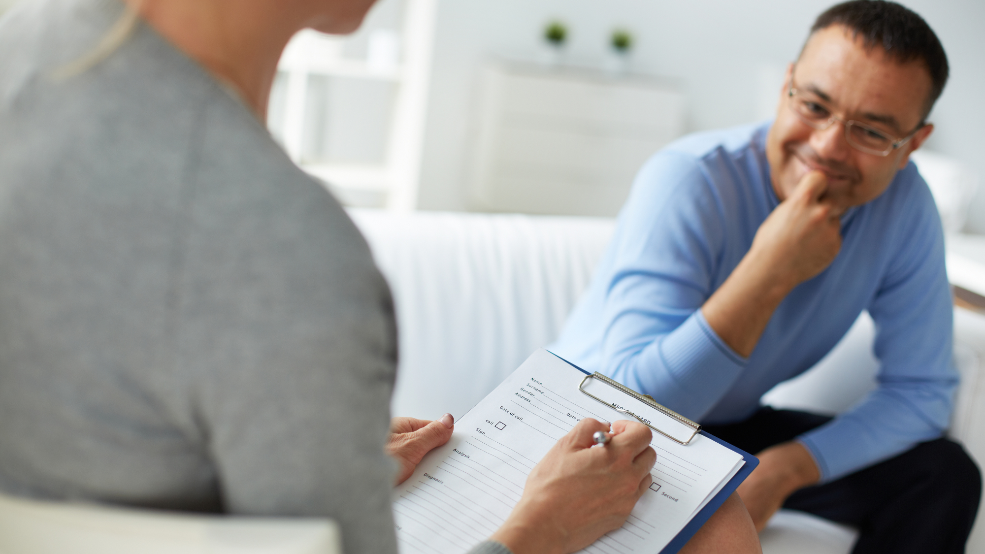 smiling man in counseling